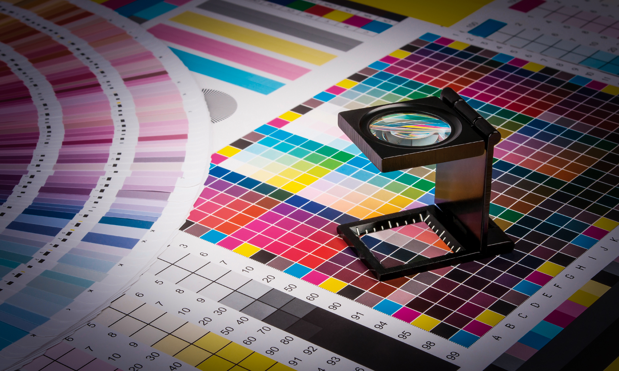 Colour swatches checked under a loupe